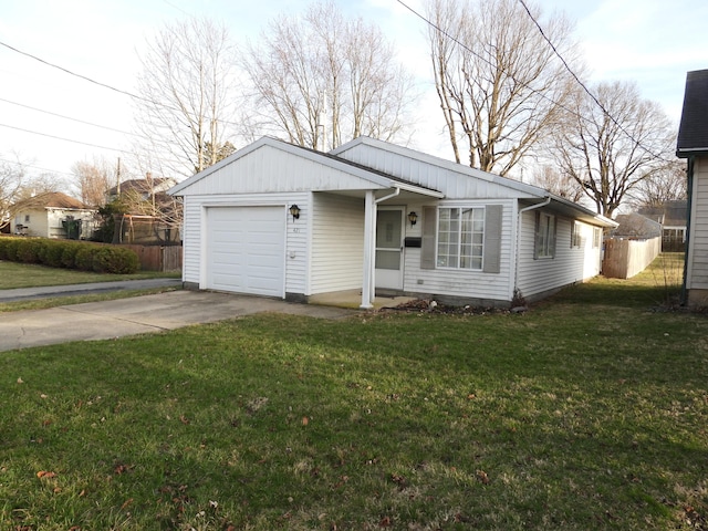 421 Summit St, Sidney, OH 45365 - view of front of home with a garage, a front yard, driveway, and fence