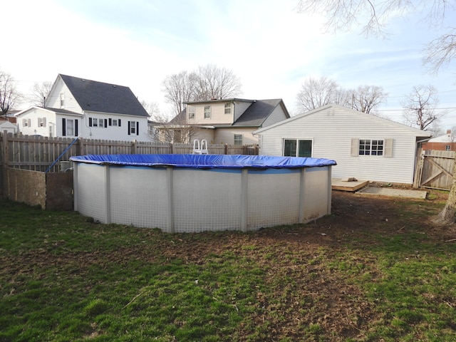 421 Summit St, Sidney, OH 45365 - view of pool featuring a yard, a fenced in pool, and fence