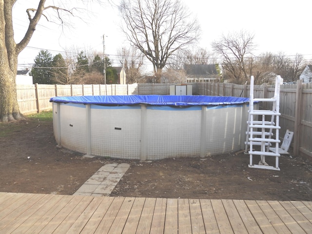 421 Summit St, Sidney, OH 45365 - view of swimming pool with a deck, a fenced backyard, and a fenced in pool