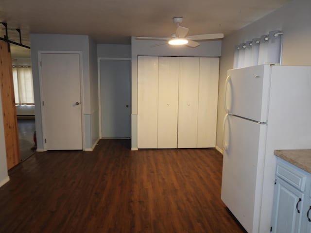 421 Summit St, Sidney, OH 45365 - kitchen with dark wood-style floors, freestanding refrigerator, and ceiling fan