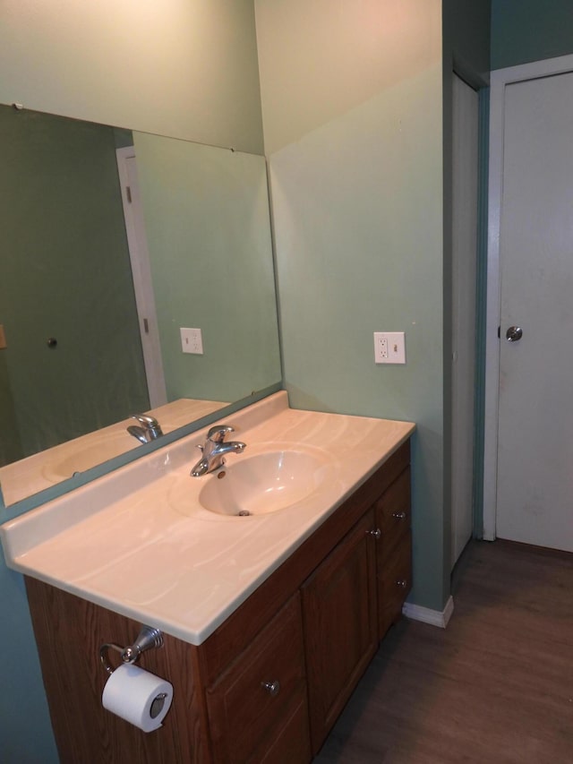 421 Summit St, Sidney, OH 45365 - bathroom featuring vanity and wood finished floors