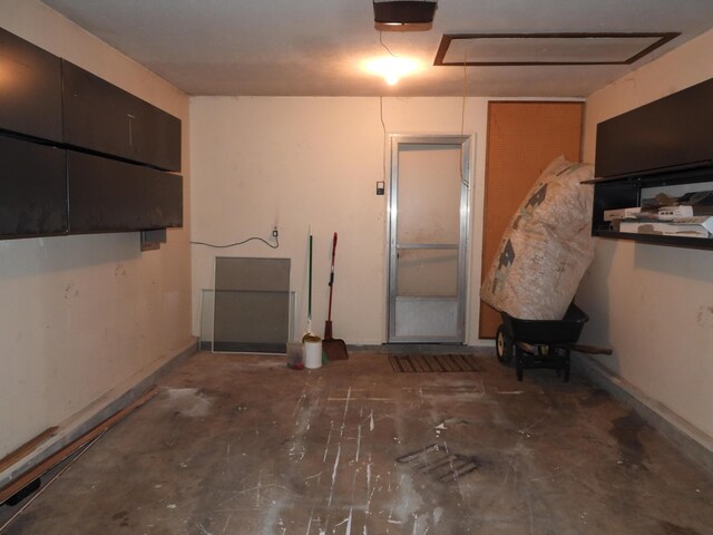 421 Summit St, Sidney, OH 45365 - garage featuring a wood stove and a garage door opener