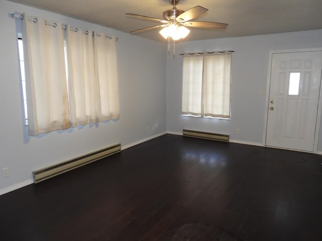 421 Summit St, Sidney, OH 45365 - entryway with dark wood-type flooring, a ceiling fan, baseboards, and baseboard heating