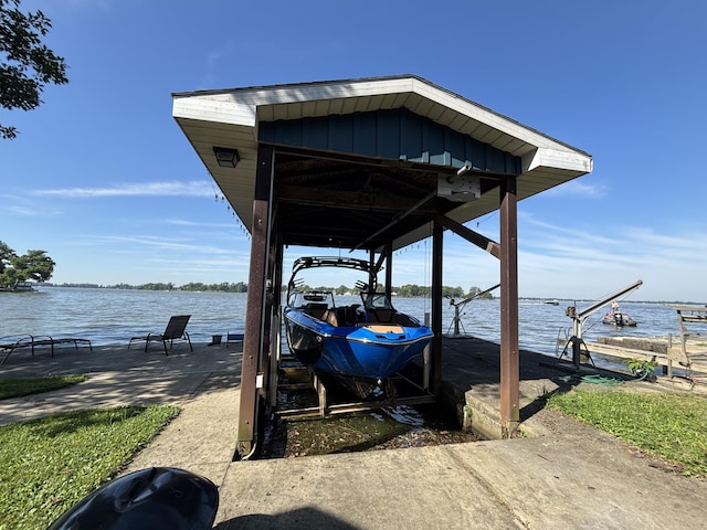 9029 Maple St, Huntsville, OH 43324 - dock area featuring boat lift and a water view