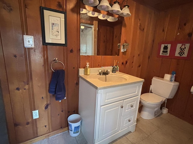 9029 Maple St, Huntsville, OH 43324 - bathroom with vanity, wooden walls, and tile patterned floors