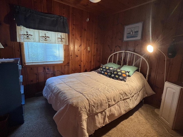 9029 Maple St, Huntsville, OH 43324 - carpeted bedroom featuring wooden walls