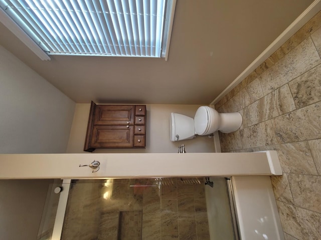 bathroom with tile walls