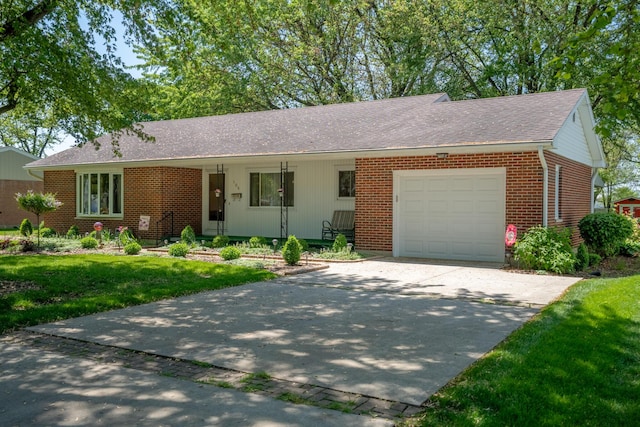 106 Westview Dr, Arcanum, OH 45304 - ranch-style home featuring an attached garage, concrete driveway, brick siding, a front yard, and covered porch