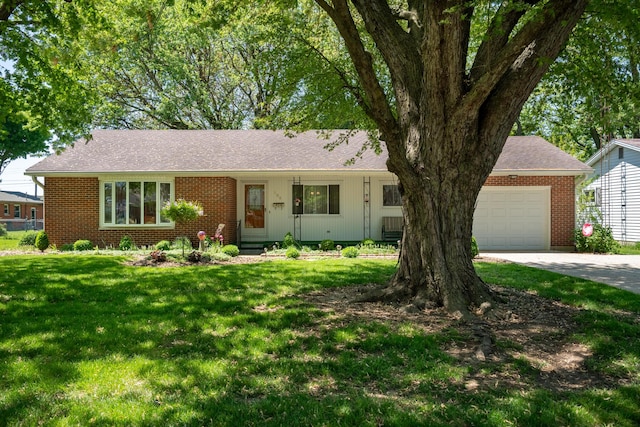 106 Westview Dr, Arcanum, OH 45304 - single story home with brick siding, an attached garage, a front lawn, and concrete driveway