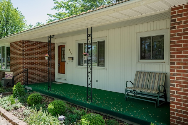 106 Westview Dr, Arcanum, OH 45304 - property entrance with brick siding and covered porch