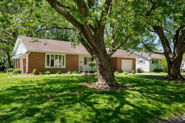 106 Westview Dr, Arcanum, OH 45304 - single story home featuring brick siding, a front yard, and a garage