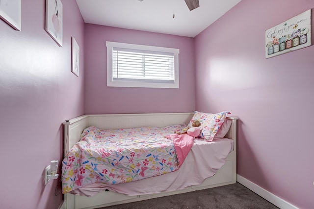 bedroom featuring ceiling fan, carpet, and baseboards