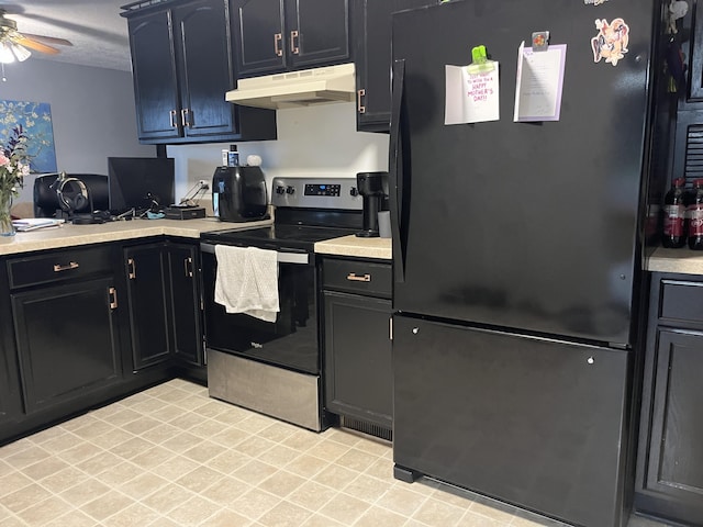 320 E Anthony St, Celina, OH 45822 - kitchen with freestanding refrigerator, under cabinet range hood, electric stove, and light countertops