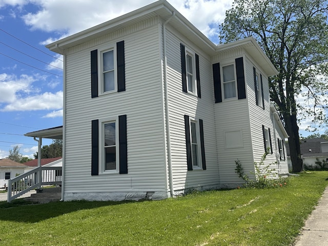 301 Plumvalley St, Bellefontaine, OH 43311 - view of home's exterior featuring a yard