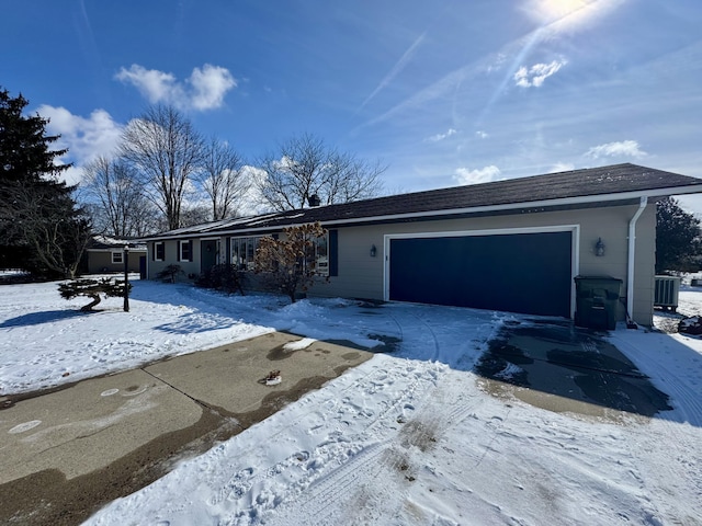 single story home with a garage