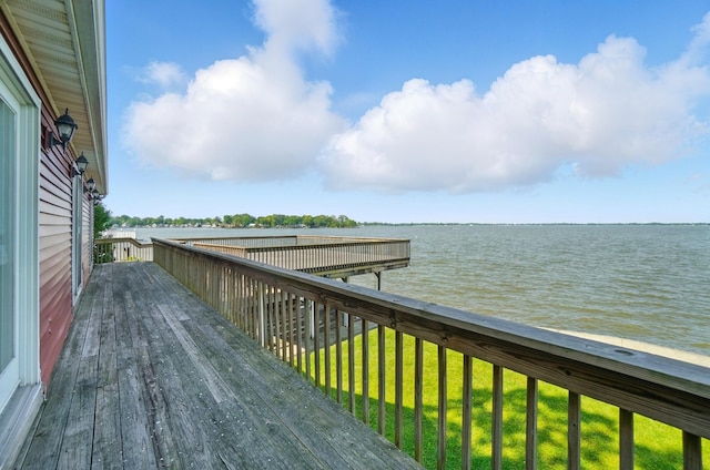 9113 Lake Ave, Huntsville, OH 43324 - wooden terrace featuring a water view