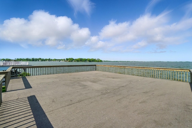 9113 Lake Ave, Huntsville, OH 43324 - wooden terrace featuring a water view