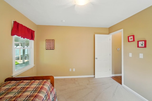 9113 Lake Ave, Huntsville, OH 43324 - bedroom with carpet and baseboards