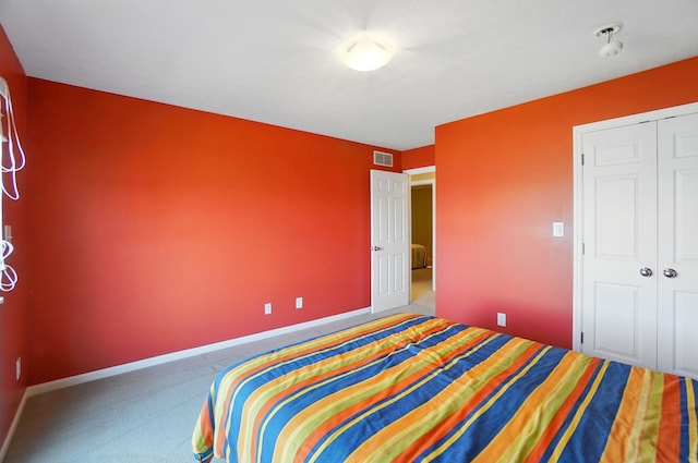 9113 Lake Ave, Huntsville, OH 43324 - bedroom with carpet flooring and a closet