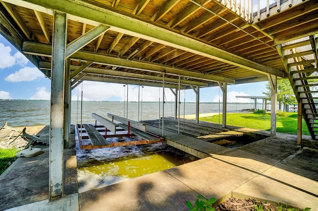 9113 Lake Ave, Huntsville, OH 43324 - dock featuring boat lift and a water view
