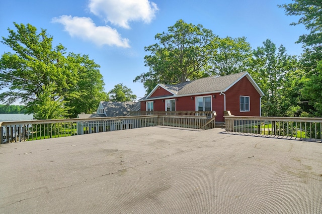 9113 Lake Ave, Huntsville, OH 43324 - view of front of house with a wooden deck