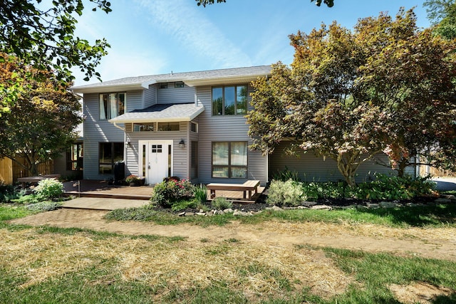 view of front of house with a patio area