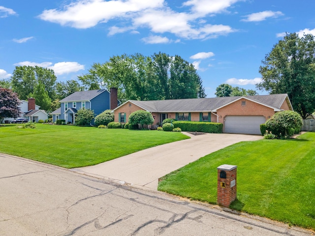 1686 Laurel Creek Dr, Troy, OH 45373 - view of front facade with a garage, driveway, a front yard, and brick siding