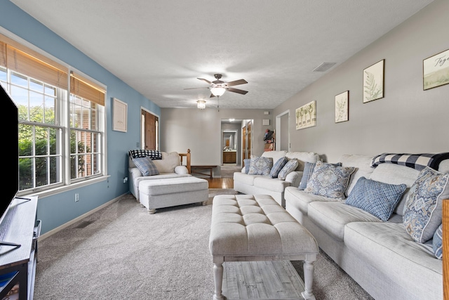 1686 Laurel Creek Dr, Troy, OH 45373 - living area with a ceiling fan and carpet