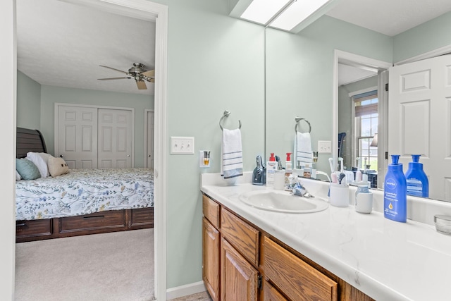 1686 Laurel Creek Dr, Troy, OH 45373 - bathroom with vanity, ensuite bath, and a ceiling fan