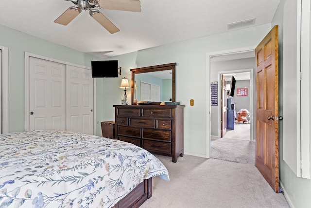 1686 Laurel Creek Dr, Troy, OH 45373 - bedroom featuring light carpet, a closet, and ceiling fan