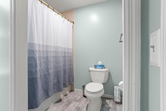 1686 Laurel Creek Dr, Troy, OH 45373 - bathroom with wood finished floors and curtained shower