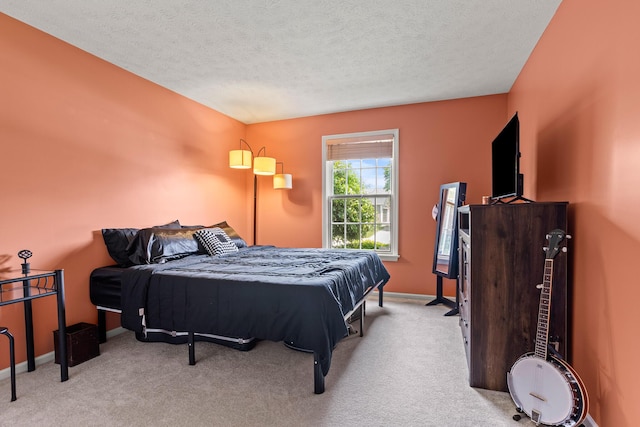 1686 Laurel Creek Dr, Troy, OH 45373 - carpeted bedroom featuring a textured ceiling and baseboards