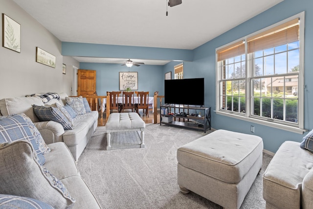 1686 Laurel Creek Dr, Troy, OH 45373 - living room with a ceiling fan and carpet floors