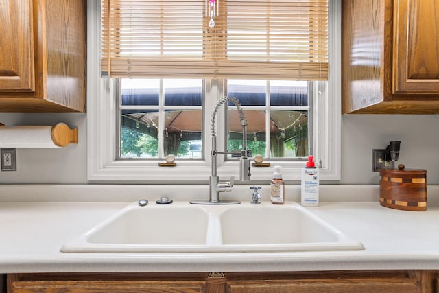 1686 Laurel Creek Dr, Troy, OH 45373 - kitchen view of brown cabinetry and light countertops
