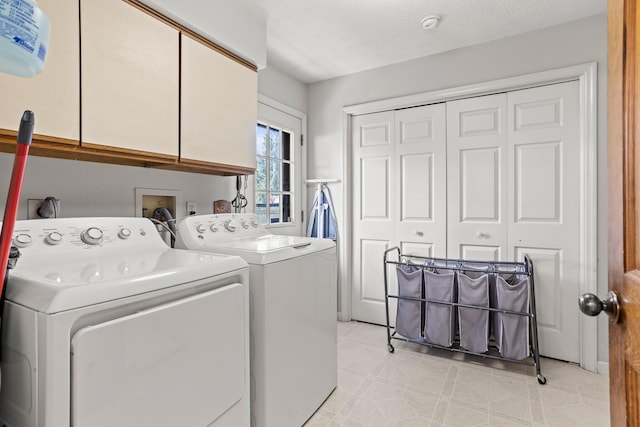 1686 Laurel Creek Dr, Troy, OH 45373 - washroom with cabinet space and washer and clothes dryer