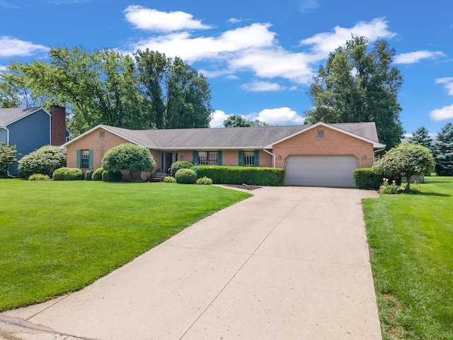 1686 Laurel Creek Dr, Troy, OH 45373 - single story home featuring brick siding, an attached garage, concrete driveway, and a front lawn