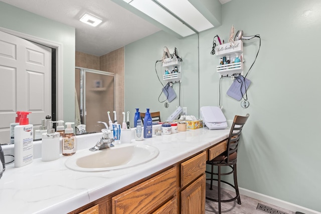 1686 Laurel Creek Dr, Troy, OH 45373 - full bathroom featuring a stall shower and vanity