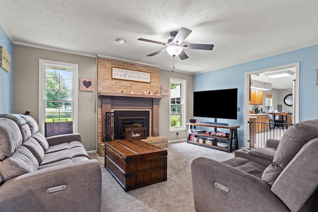 1686 Laurel Creek Dr, Troy, OH 45373 - living area featuring carpet flooring, a textured ceiling, a ceiling fan, a fireplace, and ornamental molding