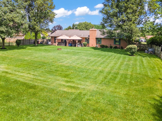 1686 Laurel Creek Dr, Troy, OH 45373 - fenced backyard featuring a gazebo