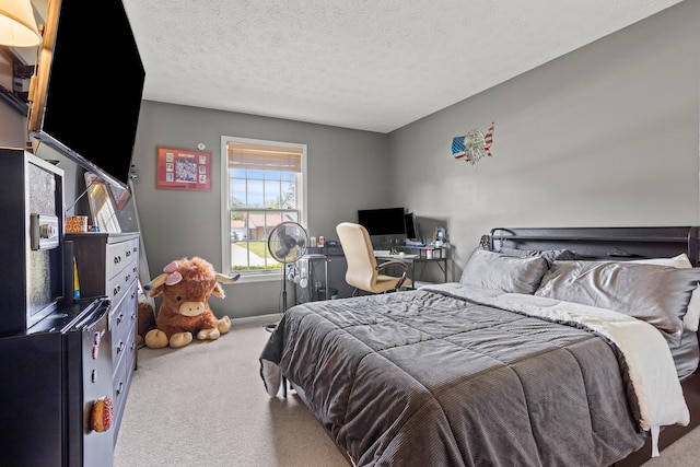 1686 Laurel Creek Dr, Troy, OH 45373 - bedroom with carpet flooring and a textured ceiling