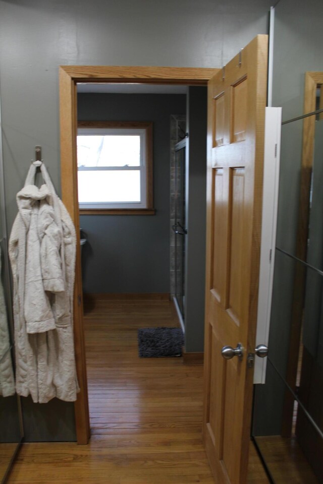 hallway featuring wood finished floors