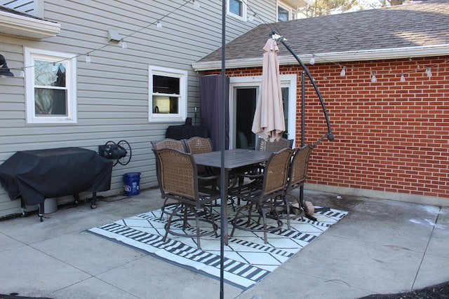 view of patio / terrace with grilling area and outdoor dining area