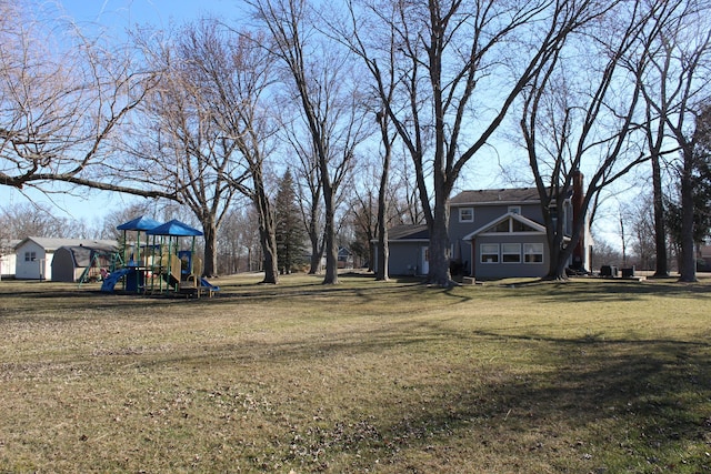 view of yard featuring playground community