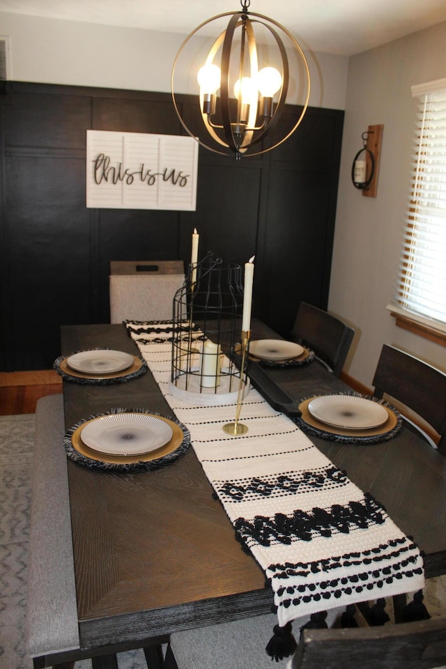 dining area with a chandelier