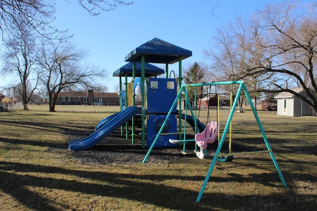 community play area with a lawn