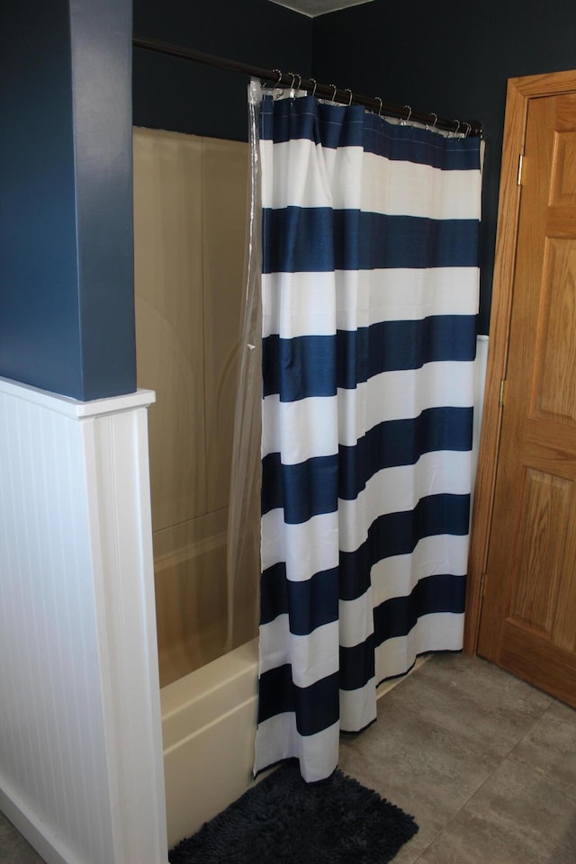bathroom featuring shower / bath combination with curtain