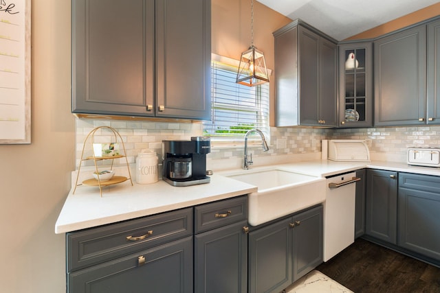 5266 State Route 540, Bellefontaine, OH 43311 - kitchen with dishwasher, glass insert cabinets, decorative backsplash, and light countertops