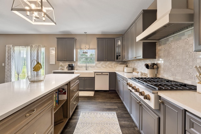 5266 State Route 540, Bellefontaine, OH 43311 - kitchen featuring custom range hood, white dishwasher, stainless steel gas stovetop, and gray cabinetry