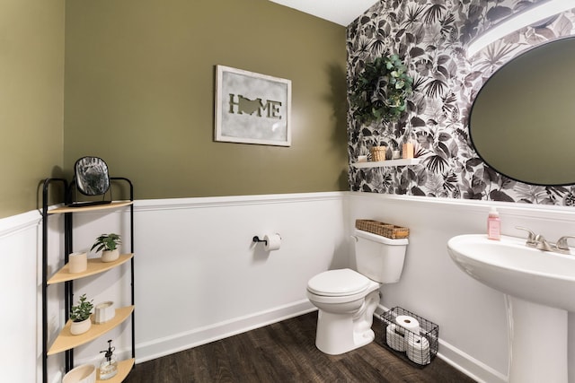 5266 State Route 540, Bellefontaine, OH 43311 - half bathroom featuring wallpapered walls and wood finished floors