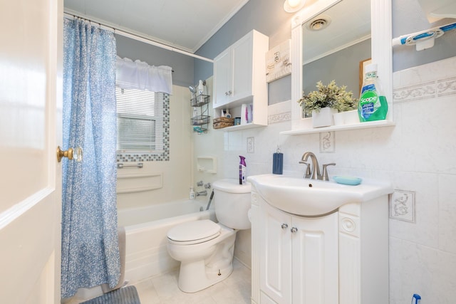 844 Reservoir Rd, Bellefontaine, OH 43311 - bathroom with ornamental molding, tile walls, shower / bath combo, vanity, and tile patterned floors